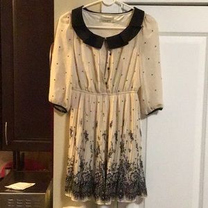 Ladies black and cream pleated dress